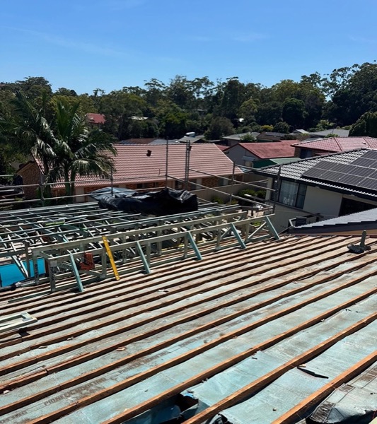 Steel roof battens set out across a house frame