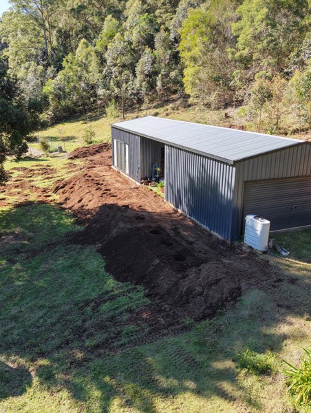 A shed standing on a cut and levelled site