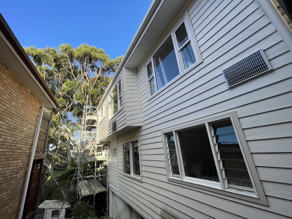 A weatherboard home with new aluminium windows fitted